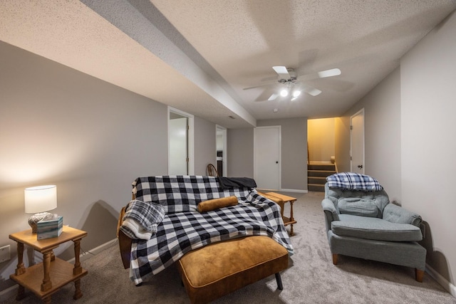 2513 Aspen Ln SW, Rochester, MN 55902 - living area with carpet flooring, baseboards, a ceiling fan, and a textured ceiling