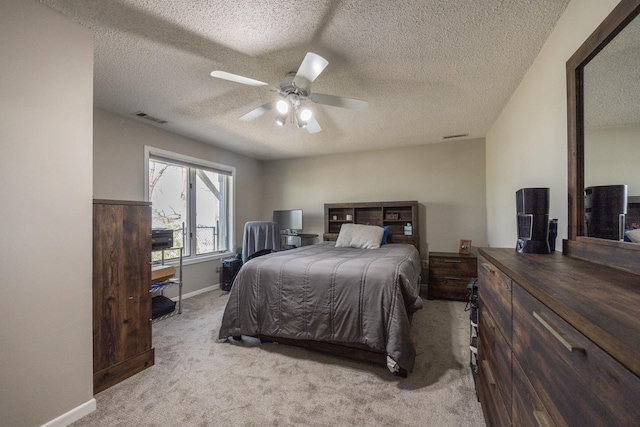 2513 Aspen Ln SW, Rochester, MN 55902 - bedroom featuring carpet flooring, a textured ceiling, ceiling fan, and baseboards