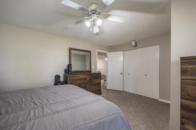 2513 Aspen Ln SW, Rochester, MN 55902 - bedroom with a textured ceiling, a ceiling fan, a closet, and dark carpet