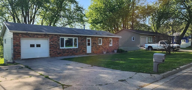 410 Wedgewood Rd, Albert Lea, MN 56007 - single story home featuring driveway, brick siding, a front lawn, and a garage