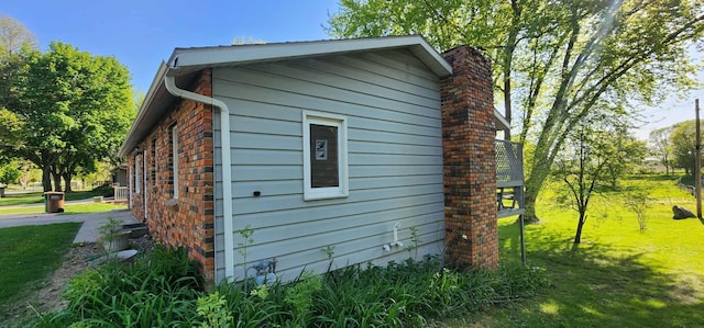 410 Wedgewood Rd, Albert Lea, MN 56007 - view of home's exterior with a yard