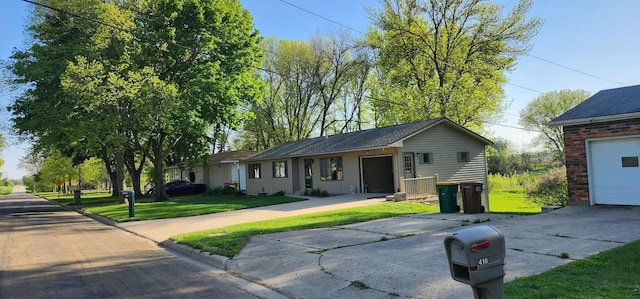 410 Wedgewood Rd, Albert Lea, MN 56007 - single story home with concrete driveway, a front lawn, and a garage