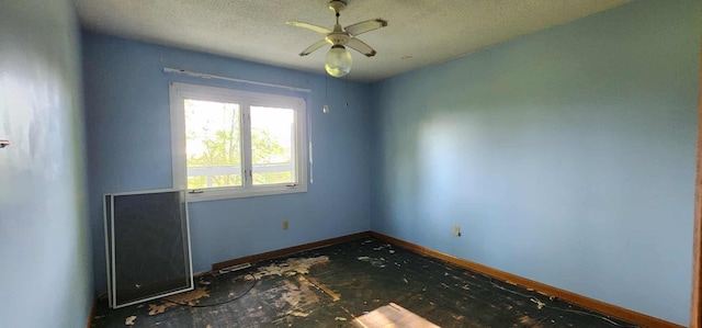 410 Wedgewood Rd, Albert Lea, MN 56007 - empty room with baseboards, a textured ceiling, and ceiling fan