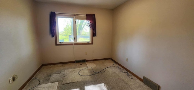 410 Wedgewood Rd, Albert Lea, MN 56007 - unfurnished room featuring baseboards and light colored carpet