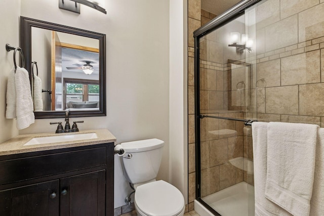 1039 Briar Creek Rd, Eagan, MN 55123 - full bathroom featuring toilet, a shower stall, vanity, and ceiling fan