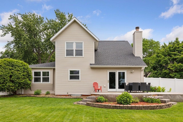 1039 Briar Creek Rd, Eagan, MN 55123 - rear view of house featuring a chimney, roof with shingles, and a patio area