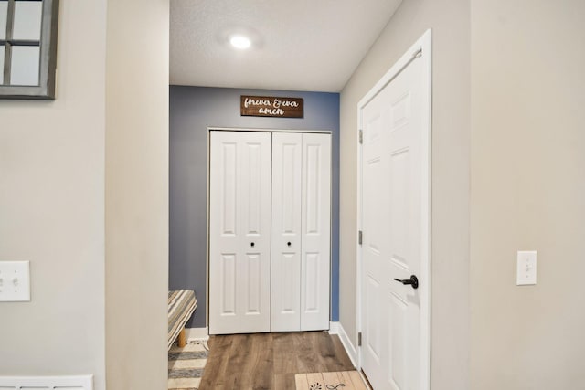 7516 Ochoa Ave NE, Otsego, MN 55330 - corridor with wood finished floors and baseboards