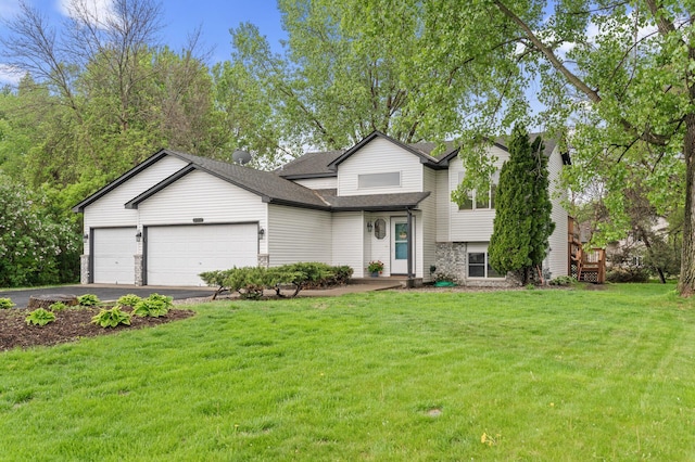 15110 Ute St NW, Ramsey, MN 55303 - tri-level home featuring a garage, a front yard, driveway, and roof with shingles
