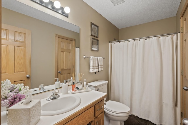 15110 Ute St NW, Ramsey, MN 55303 - bathroom featuring toilet, vanity, a textured ceiling, curtained shower, and tile patterned floors