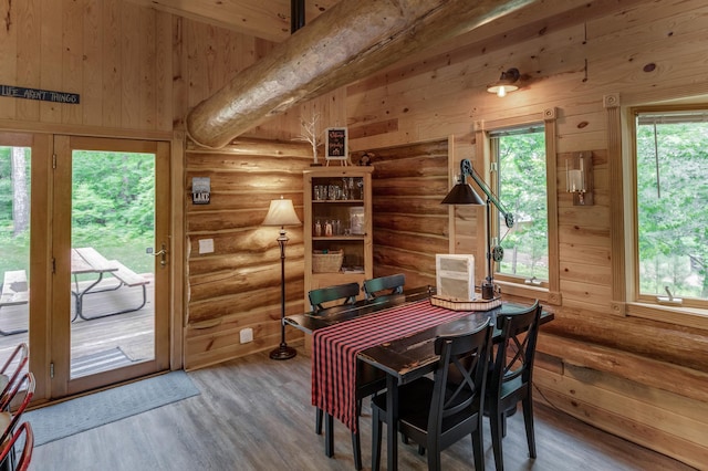 17377 Paradise Shores Rd, Maple Grove Twp, MN 56401 - dining area with rustic walls and wood finished floors