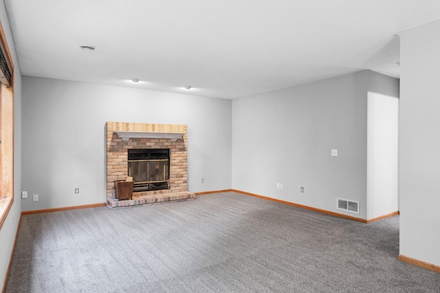 3649 Tower Pond Dr, Anoka, MN 55303 - unfurnished living room with carpet and a fireplace