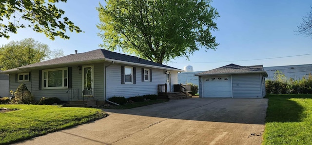 621 16th St, Albert Lea, MN 56007 - single story home with an outdoor structure, a detached garage, a front lawn, and concrete driveway