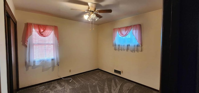 621 16th St, Albert Lea, MN 56007 - empty room featuring carpet floors, ceiling fan, and baseboards