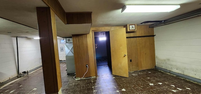 621 16th St, Albert Lea, MN 56007 - finished below grade area featuring tile patterned floors and wood walls