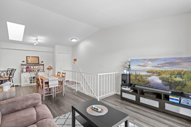 1030 Pond View Ct, Vadnais Heights, MN 55127 - living room with lofted ceiling, wood finished floors, and a skylight