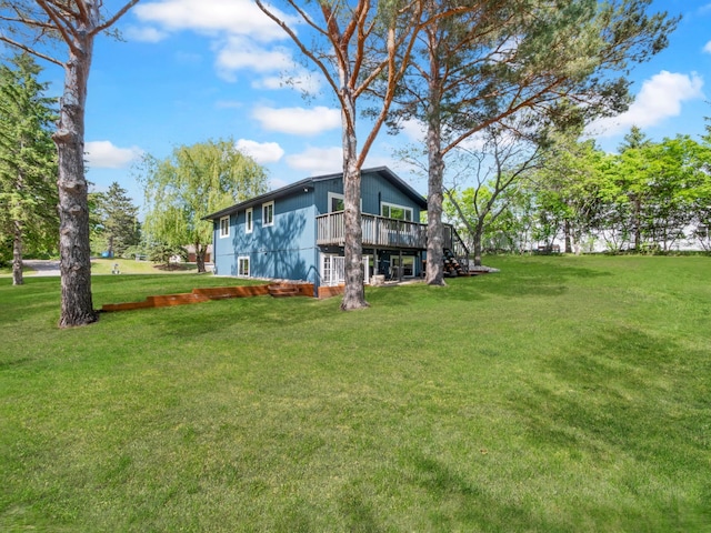 2908 Crestwood Dr NE, Alexandria Twp, MN 56308 - view of grassy yard with a wooden deck and stairs