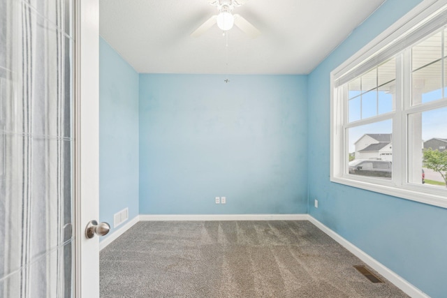 17684 59th St NE, Otsego, MN 55374 - empty room with carpet floors, ceiling fan, and baseboards