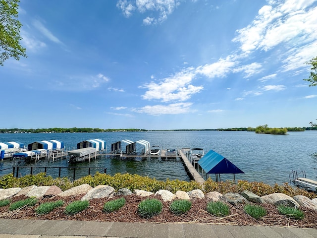 4407 Wilshire Blvd Unit 110, Mound, MN 55364 - dock area featuring a water view and boat lift