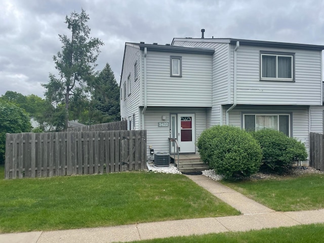 3422 Highlander Dr, Eagan, MN 55122 - view of front facade featuring central AC