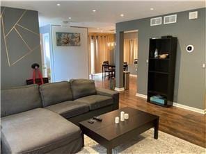 3422 Highlander Dr, Eagan, MN 55122 - living area with baseboards, wood finished floors, and recessed lighting