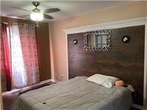 3422 Highlander Dr, Eagan, MN 55122 - bedroom with baseboards and a ceiling fan