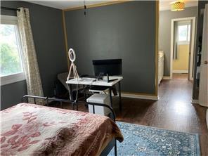 3422 Highlander Dr, Eagan, MN 55122 - bedroom with baseboards and a desk