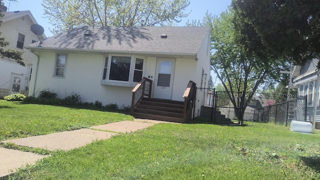 1339 Payne Ave, Saint Paul, MN 55101 - bungalow-style home with a shingled roof and stucco siding