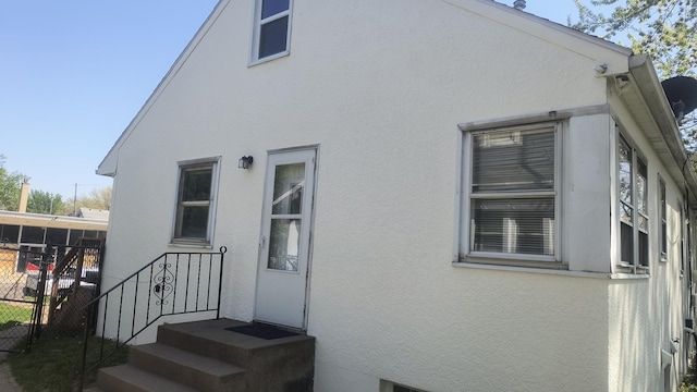 1339 Payne Ave, Saint Paul, MN 55101 - back of property featuring stucco siding