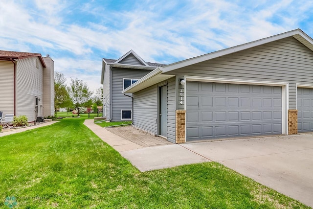 2814 26th Street Cir S, Moorhead, MN 56560 - view of front facade featuring a front yard and an outdoor structure