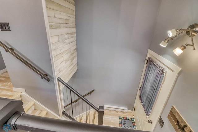 2814 26th Street Cir S, Moorhead, MN 56560 - stairway featuring a baseboard radiator and baseboards