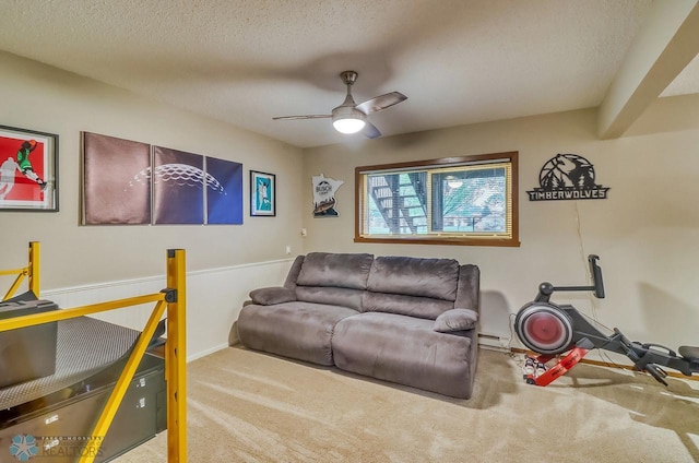 2814 26th Street Cir S, Moorhead, MN 56560 - carpeted living room with ceiling fan, a textured ceiling, and a baseboard heating unit