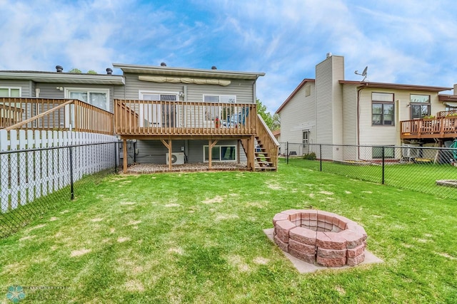 2814 26th Street Cir S, Moorhead, MN 56560 - rear view of property featuring stairs, a deck, an outdoor fire pit, and a cooling unit