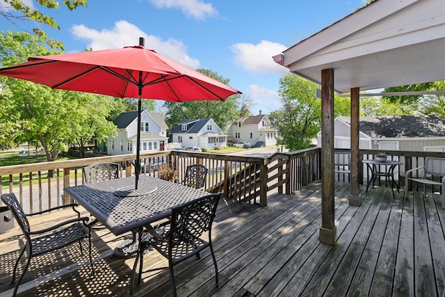 285 Cliff St Unit 4, Saint Paul, MN 55102 - wooden terrace featuring outdoor dining space and a residential view