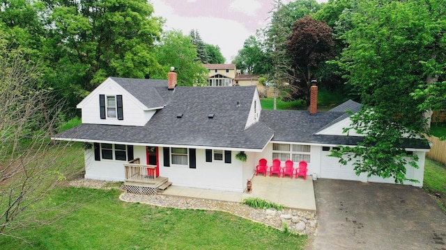 5117 Clear Spring Rd, Minnetonka, MN 55345 - view of front of house featuring a shingled roof, a porch, an attached garage, a chimney, and concrete driveway