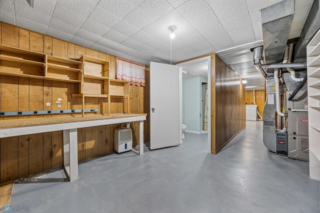 2207 16th St S, Fargo, ND 58103 - basement with wood walls and heating unit