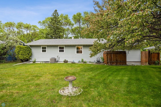 2207 16th St S, Fargo, ND 58103 - rear view of property with central AC unit