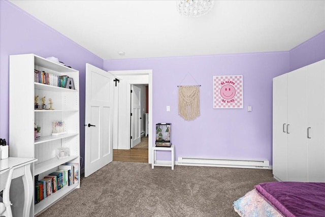 25 Maki Rd, Esko, MN 55733 - carpeted bedroom with a baseboard radiator
