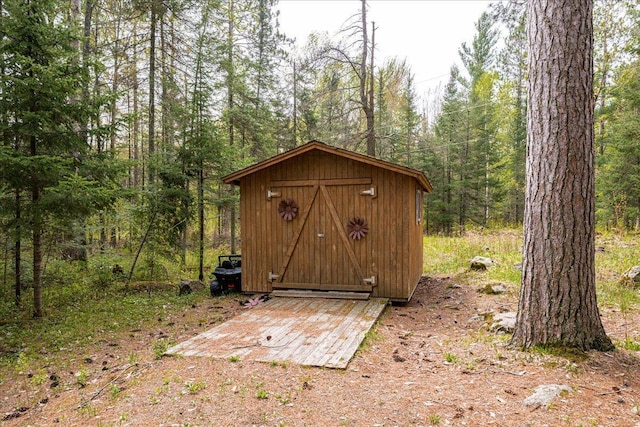 25 Maki Rd, Esko, MN 55733 - view of shed featuring a wooded view