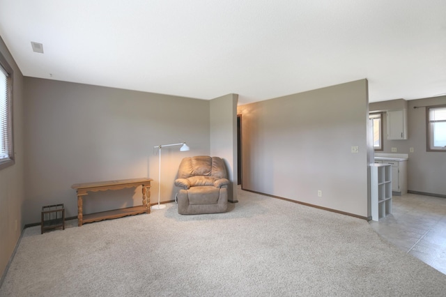 unfurnished room with baseboards