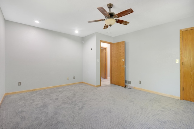 2515 Belmont Ln E, North Saint Paul, MN 55109 - unfurnished bedroom with light carpet, baseboards, recessed lighting, and ceiling fan