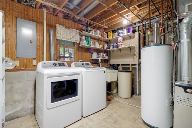 2515 Belmont Ln E, North Saint Paul, MN 55109 - laundry area featuring water heater, electric panel, and washer and clothes dryer
