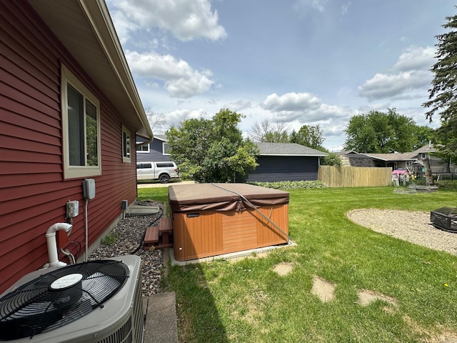 404 5th Ave NE, Kasson, MN 55944 - view of yard featuring a hot tub and cooling unit