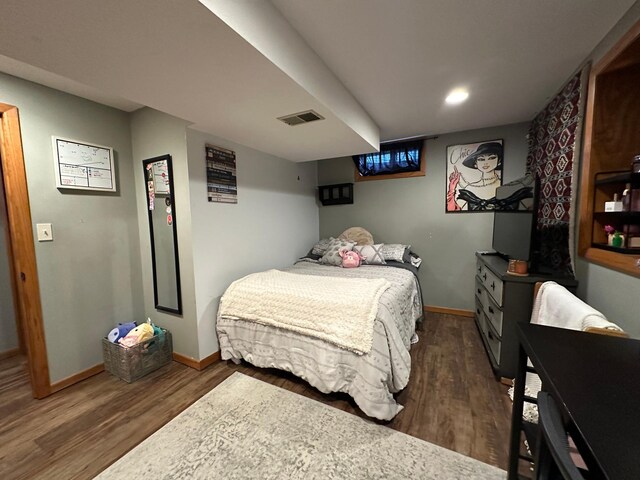 404 5th Ave NE, Kasson, MN 55944 - bedroom featuring wood finished floors, baseboards, and recessed lighting