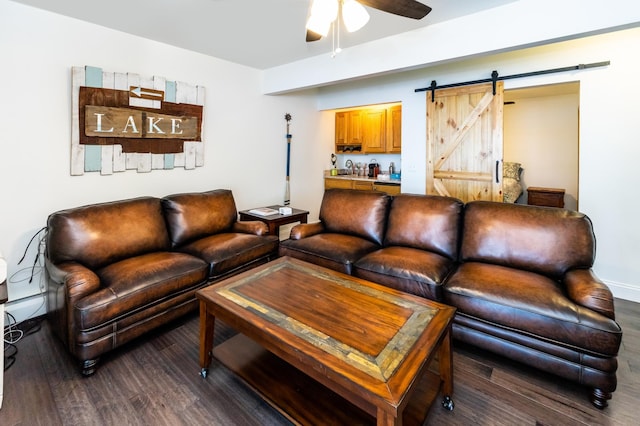 3010 Fairview Rd SW, Prior Lake, MN 55372 - living area featuring a barn door, a ceiling fan, and dark wood-type flooring