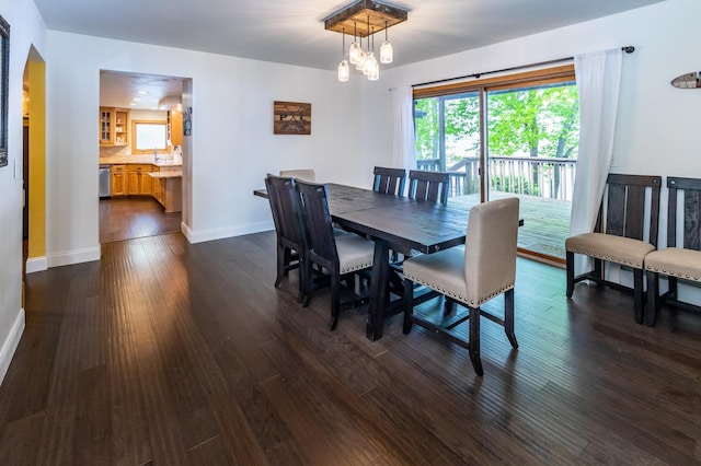 3010 Fairview Rd SW, Prior Lake, MN 55372 - dining space featuring dark wood-style flooring and baseboards