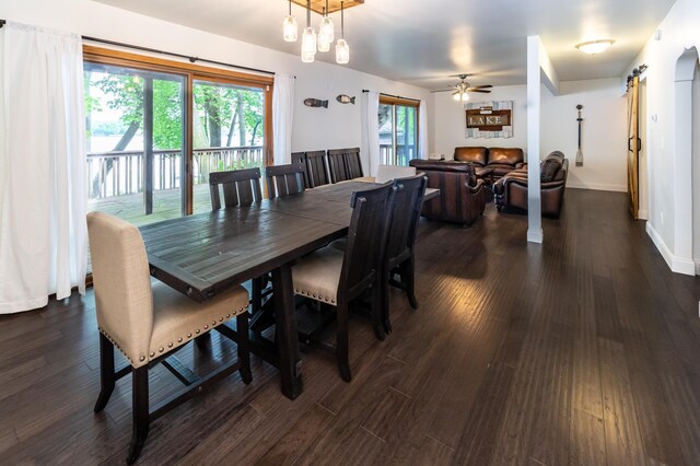 3010 Fairview Rd SW, Prior Lake, MN 55372 - dining room with dark wood-type flooring, a ceiling fan, and baseboards