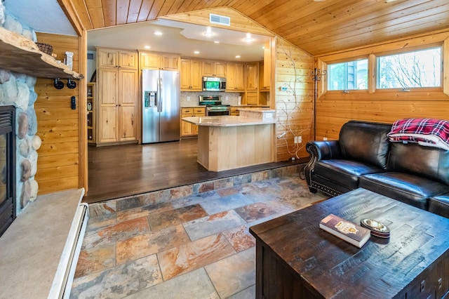 3010 Fairview Rd SW, Prior Lake, MN 55372 - kitchen featuring appliances with stainless steel finishes, lofted ceiling, wood ceiling, open floor plan, and a fireplace