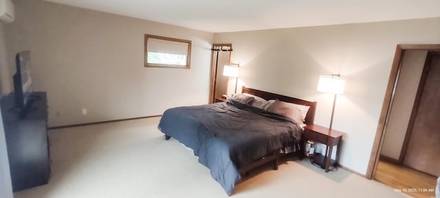 620 Maple St, Dassel, MN 55325 - bedroom with a wall unit AC, baseboards, and light colored carpet