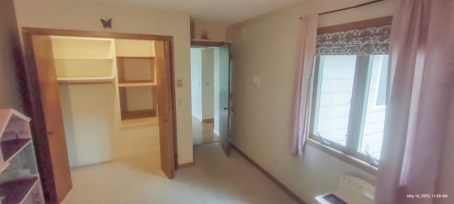 620 Maple St, Dassel, MN 55325 - unfurnished bedroom featuring light colored carpet