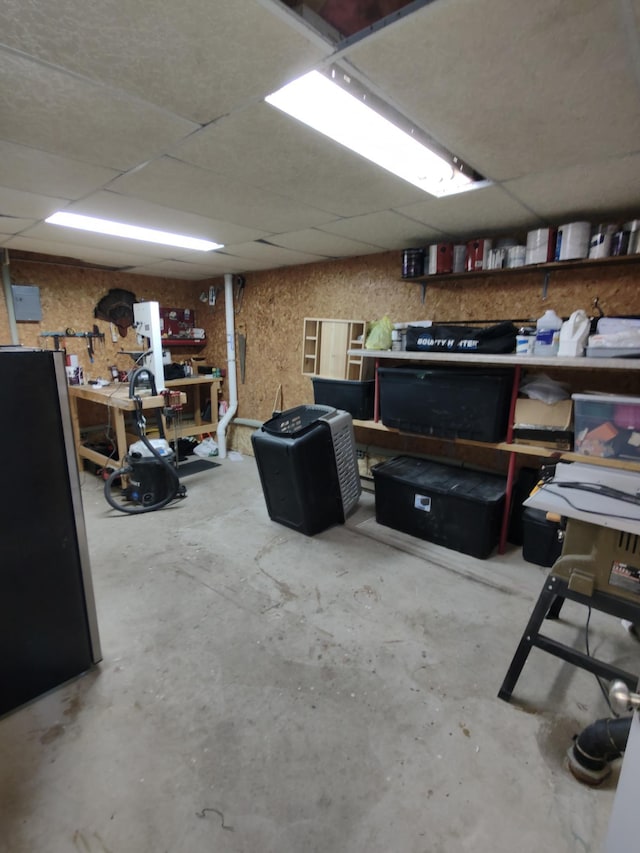 620 Maple St, Dassel, MN 55325 - basement with a drop ceiling and a workshop area